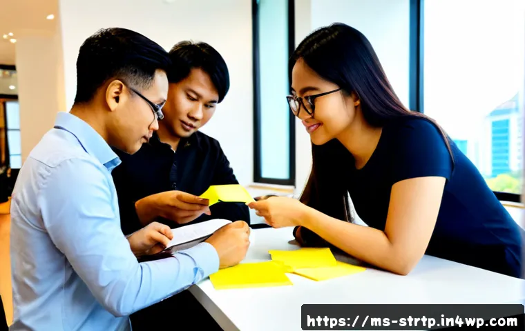 Home 17 린 스타트업의 제품 개선 주기 - Photorealistic Malaysian startup team reviewing a physical product prototype at a bright modern cowo...